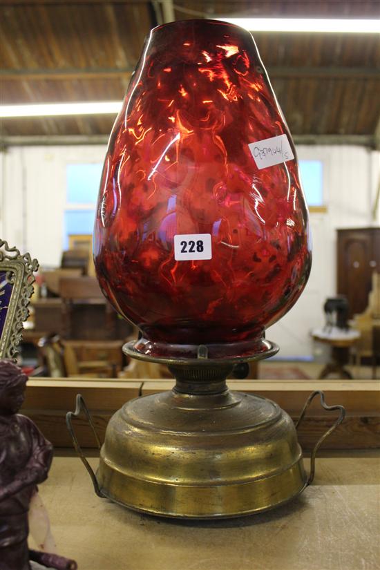 Brass oil lamp with cranberry shade